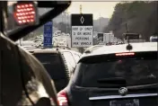  ?? ANDREW NELLES — THE TENNESSEAN VIA AP ?? Signs mark an HOV lane on Interstate 65in Nashville, Tenn., on Dec. 6.