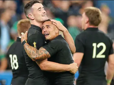  ?? ?? TIME TO PARTY: New Zealand’s players celebrate at the final whistle after an epic clash in Paris last night