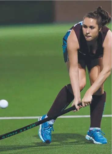  ?? Picture: STEWART McLEAN ?? SCORELESS DRAW: Brothers’ Hannah Whalan on the attack in the A-grade women’s hockey match between Souths and Brothers.