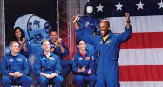  ?? DAVID J. PHILLIP/AP ?? Victor Glover is introduced during a NASA event Friday in Houston to announce the astronauts assigned to the first flight tests and missions of the Boeing CST-100 Starliner and SpaceX Crew Dragon.