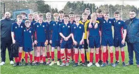  ??  ?? NAME ON TROPHY: The Dundee Schools Under-15 football team.