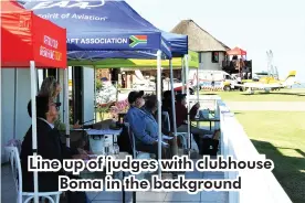  ??  ?? Line up of judges with clubhouse
Boma in the background