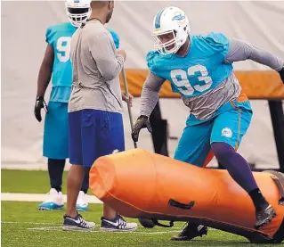  ?? LYNNE SLADKY/ASSOCIATED PRESS ?? Ndamukong Suh’s tactics have come into question, but there’s no denying the defensive tackle’s talent. He and the Miami Dolphins face the Pittsburgh Steelers in Sunday’s NFL playoffs.