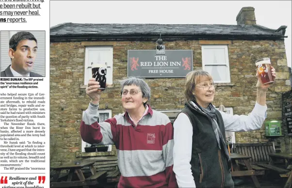  ?? PICTURES: JONATHAN GAWTHORPE/PA ?? RISHI SUNAK: The MP praised the “enormous resilience and spirit” of the flooding victims.
OPEN FOR CHRISTMAS: Rowena Hutchinson with her sister Marguerita outside the Langthwait­e pub that took a battering in the summer storm.