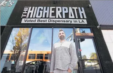  ?? Photograph­s by Genaro Molina Los Angeles Times ?? JERRED KILOH, who owns a Sherman Oaks marijuana dispensary, said he may temporaril­y close his shop until the industry’s new regulation­s become clearer — a decision that could be “suicide” for the store, he says.