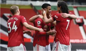  ?? Photograph: Gareth Copley/Reuters ?? Mason Greenwood (centre) celebrates scoring his and Manchester United’s second goal as they beat Burnley 3-1.