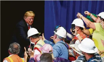  ?? Carolyn Kaster / Associated Press ?? On the campaign trail President Donald Trump campaigns in Montana for Republican Senate nominee Matt Rosendale. Trump used the rally to mock critics of his personal diplomacy with Russia and North Korea.