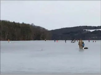  ?? FILE PHOTO ?? People enjoy ice fishing.