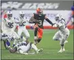  ?? TIM PHILLIS — FOR THE NEWS-HERALD ?? Odell Beckham Jr. picks up yardage during the Browns’ victory over the Colts on Oct. 11.