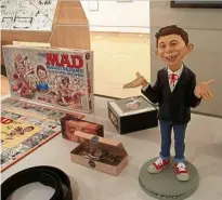  ?? — AP ?? The Artistical­ly Mad: Seven Decades Of Satire
exhibition includes memorabili­a such as trading cards and board games.