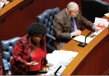  ?? (Arkansas Democrat-Gazette/Thomas Metthe) ?? Sen. Linda Chesterfie­ld, D-Little Rock, asks a question about House Bill 1307, which would require public entities to divest holdings with financial service providers that discrimina­te against energy, fossil fuel, firearms or ammunition companies, during the Senate session on Monday at the state Capitol in Little Rock.