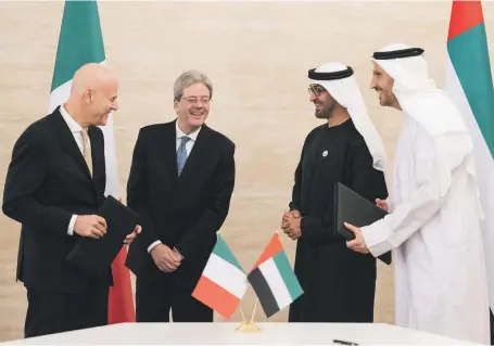  ?? Ryan Carter / Crown Prince Court ?? Sheikh Mohammed bin Zayed, Crown Prince of Abu Dhabi and Deputy Supreme Commander of the Armed Forces, presides over the signing of a deal between Mubadala Petroleum and Eni. Also present were Khaldoon Al Mubarak, chairman of Mubadala Investment...