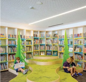  ??  ?? Perforated ceiling panels are used in the library at Northern Beaches Christian School (NSW).