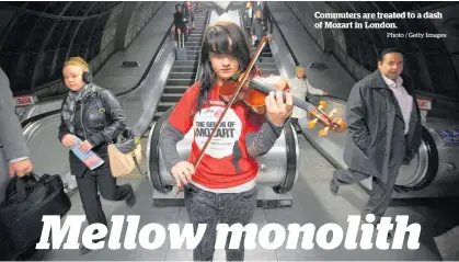  ?? Photo / Getty Images ?? Commuters are treated to a dash of Mozart in London.