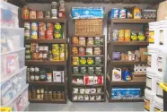  ??  ?? A storage room in one of the survival bunkers at Fortitude Ranch is stocked with food and other supplies.