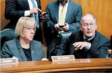  ?? ALEX BRANDON/AP ?? Lamar Alexander, R-Tenn., the chairman of the Senate health committee, and ranking member Sen. Patty Murray, DWash., convened Wednesday’s hearing to help develop fixes for insurance markets serving 20 million Americans.