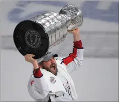  ?? Photo by John McDonnell / The Washington Post ?? Capitals superstar forward Alex Ovechkin (holding the Stanley Cup) led Washington to its first Stanley Cup title with Thursday night’s 4-3 win over the Vegas Golden Knights. Ovechkin, 32, is in position to win more titles with the Capitals loaded with young talent.