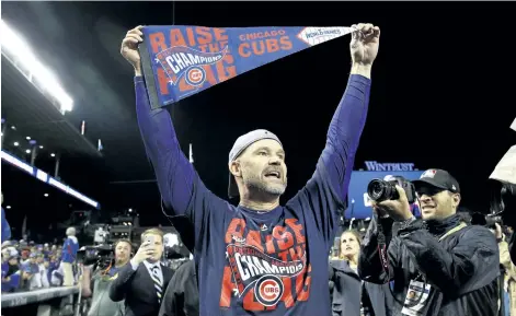  ?? NAM Y. HUH/THE ASSOCIATE PRESS ?? Chicago Cubs catcher David Ross celebrates after Game 6 of the National League baseball championsh­ip series against the Los Angeles Dodgers in Chicago. Ross, who retired after helping the Cubs win the World Series last year, is part of the 24th season of Dancing with the Stars, and his former teammates are excited to watch the ex-catcher on the show.