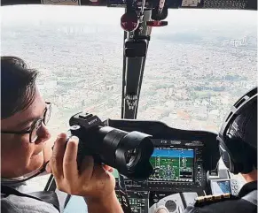  ??  ?? Taking to the skies: A journalist taking a Helicity ride. — The Straits Times/Asia News Network