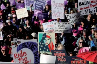  ?? STEVE MARCUS / REUTERS ?? People head into Sam Boyd Stadium for the Women’s March rally in Las Vegas, Nevada, on Sunday.