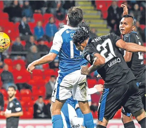  ??  ?? Carlos Pena, left, fires home Rangers’ opening goal before making it 2-0 with 12 minutes remaining, above. The £2.2 million Mexican striker doubled his tally for the season with this brace in Perth. Pictures: SNS Group.