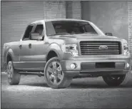  ?? The Associated Press ?? Americans are paying record prices for new cars and trucks such as the 2014 Ford F-150 STX SuperCrew truck, shown here, and they have only themselves to blame.