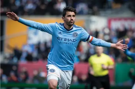  ?? IRA L. BLACK - CORBIS/GETTY IMAGES ?? New York City FC, led by captain David Villa, the MLS’s second-leading scorer, visits Toronto on Sunday. New York is just three points back of TFC.