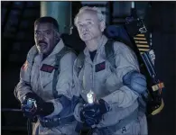  ?? ?? Winston Zeddemore (Ernie Hudson, left) and Peter Venkman (Bill Murray) get ready to do battle with some cold-blooded ghosts in “Ghostbuste­rs: Frozen Empire,” which came in at No. 1 with $45.2 million in receipts.