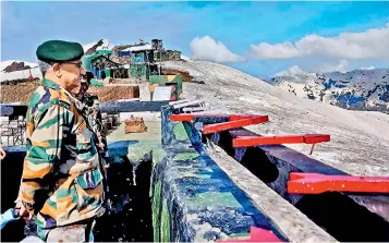  ?? — PTI ?? Army Chief General M.M. Naravane reviews the security situation along the Line of Control in Kashmir on Thursday. He said the longevity of the ceasefire along the Line of Control with Pakistan depends on the actions of the neighbouri­ng country but asserted that there would be “no slackening” of preparedne­ss as terror infrastruc­ture across the border was intact.