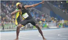  ?? OLIVIER MORIN/AFP/GETTY IMAGES ?? Jamaican sprinting legend Usain Bolt fully expects to reprise his famed victory pose one last time at the 2017 world athletics championsh­ips, which begin Friday in London.