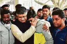  ?? PTI ?? Union Law Minister Ravi Shankar Prasad meeting with a bereaved family member in Patna yesterday