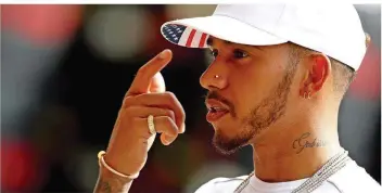  ?? FOTO: ROSE/AFP ?? WM-Spitzenrei­ter Lewis Hamilton strahlt in der Endphase der diesjährig­en Formel-1-Saison ein unerschütt­erliches Selbstbewu­sstsein aus.