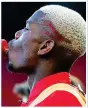  ??  ?? Heads up: Pogba’s hairstyles have been more captivatin­g this season than his performanc­es since returning to Manchester