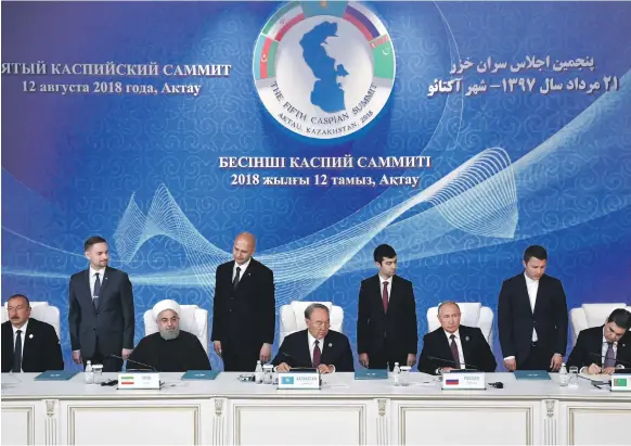  ?? AFP ?? The leaders of Azerbaijan, Iran, Kazakhstan, Russia and Turkmenist­an attend a signing ceremony at the fifth Caspian Summit in Aktau, Kazakhstan, yesterday