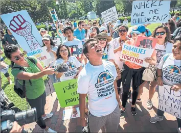  ?? ANDRE CHUNG — THE WASHINGTON POST ?? Gerson Quinteros, a “dreamer” who lives in Washington, D.C., leads protesters gathered outside the White House.