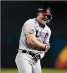  ?? Godofredo A. Vásquez/Associated Press ?? The United States’ Mike Trout celebrates after hitting a two-run single against Colombia during the fifth inning of a World Baseball Classic game in Phoenix on Wednesday.