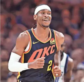  ?? ALONZO ADAMS/USA TODAY SPORTS ?? The Thunder and Shai Gilgeous-Alexander routed the Mavericks on Sunday to secure the top seed in the Western Conference.