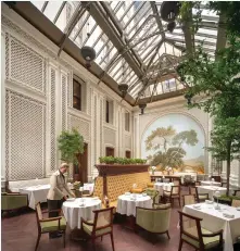  ?? Raffles Hotels ?? Meals are served at an airy indoor courtyard