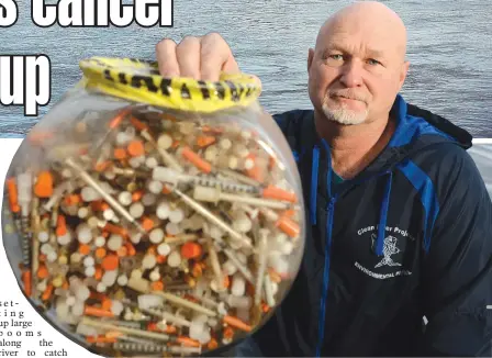  ?? STAFF FILE PHOTO, TOP, BY PATRICK WHITTEMORE, ABOVE, BY CHRISTOPHE­R EVANS ?? ‘DIDN’T WANT TO DO ANYTHING’: Rocky Morrison of the Clean River Project holds a jarful of hypodermic needles collected from the Merrimack River, top, in Haverhill, and its banks outside his Methuen office.