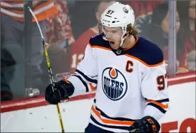  ?? JEff MACINTOSH/THE CANADIAN PRESS VIA AP ?? Edmonton Oilers’ Connor McDavid celebrates his goal against the Calgary Flames during the second period of an NHL hockey game Nov. 17, in Calgary, Alberta.