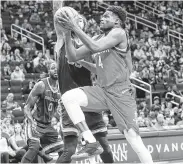  ?? Elizabeth Conley / Staff photograph­er ?? The Rockets’ Danuel House Jr., right, is averaging 8.7 points and 3.4 rebounds per game.