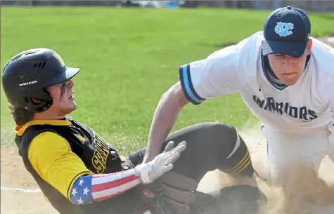  ?? Matt Freed/Post-Gazette photos ?? Central Valley’s Jack Bible tags out Montour’s Nick Walker at home Tuesday. Central Valley defeated Montour, 5-4, in a WPIAL Class 4A Section 2 game.