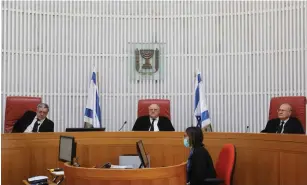  ?? (Marc Israel Sellem/The Jerusalem Post) ?? A HEARING takes place in the High Court of Justice yesterday.