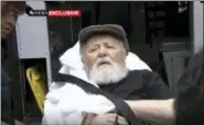  ?? ABC VIA AP ?? In this Monday frame from video, Jakiw Palij, a former Nazi concentrat­ion camp guard, is carried on a stretcher from his home in the Queens borough of New York. Palij, the last Nazi war crimes suspect facing deportatio­n from the U.S. was taken from his home and spirited early Tuesday morning to Germany, the White House said.