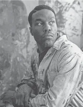  ?? PROVIDED BY PARRISH LEWIS ?? Yahya Abdul- Mateen II plays a Chicago artist who uses a terrifying supernatur­al story as inspiratio­n in the horror film “Candyman.”