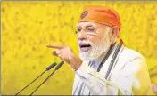  ?? PTI ?? PM Narendra Modi speaks at an event held to commemorat­e the 400th birth anniversar­y of the ninth Sikh Guru at Red Fort.