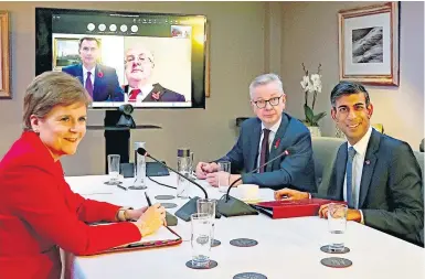  ?? ?? TALKS: Nicola Sturgeon with Michael Gove and Rishi Sunak and, on screen, Chancellor Jeremy Hunt and Wales’ First Minister Mark Drakeford at the British-irish Council summit in Blackpool.