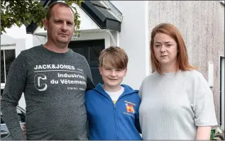  ??  ?? Harry Kehoe with parents, Richie and Emma, at their home in Coolcotts.