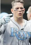  ?? LEON HALIP/GETTY IMAGES ?? Logan Morrison of the Tampa Bay Rays celebrates his two-run home run against the Detroit Tigers Sunday.