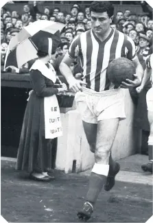  ??  ?? King Charlie Hurley leads Sunderland out at Roker Park